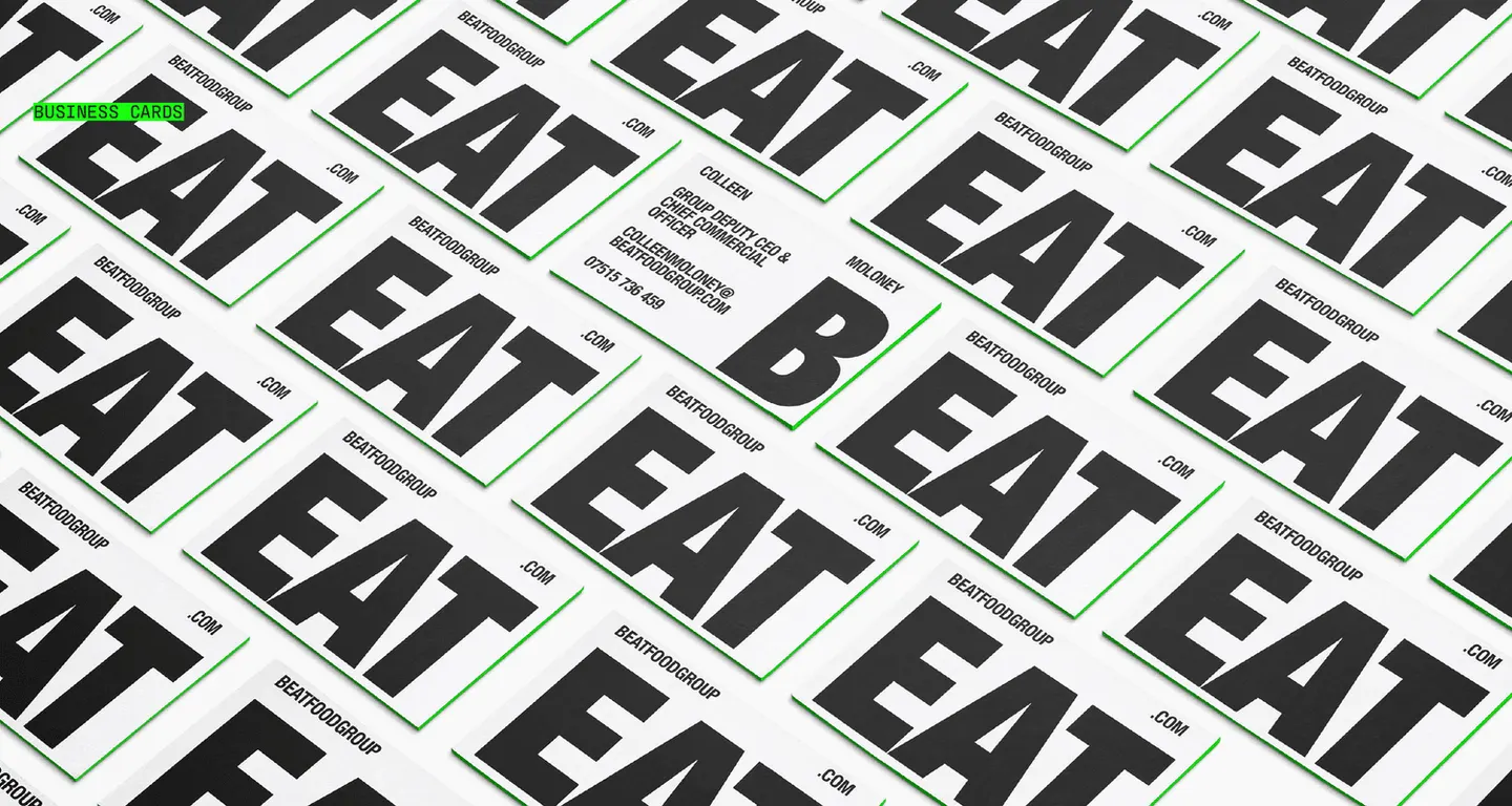 A spread of BEAT EAT printed graphics with repeated bold typography