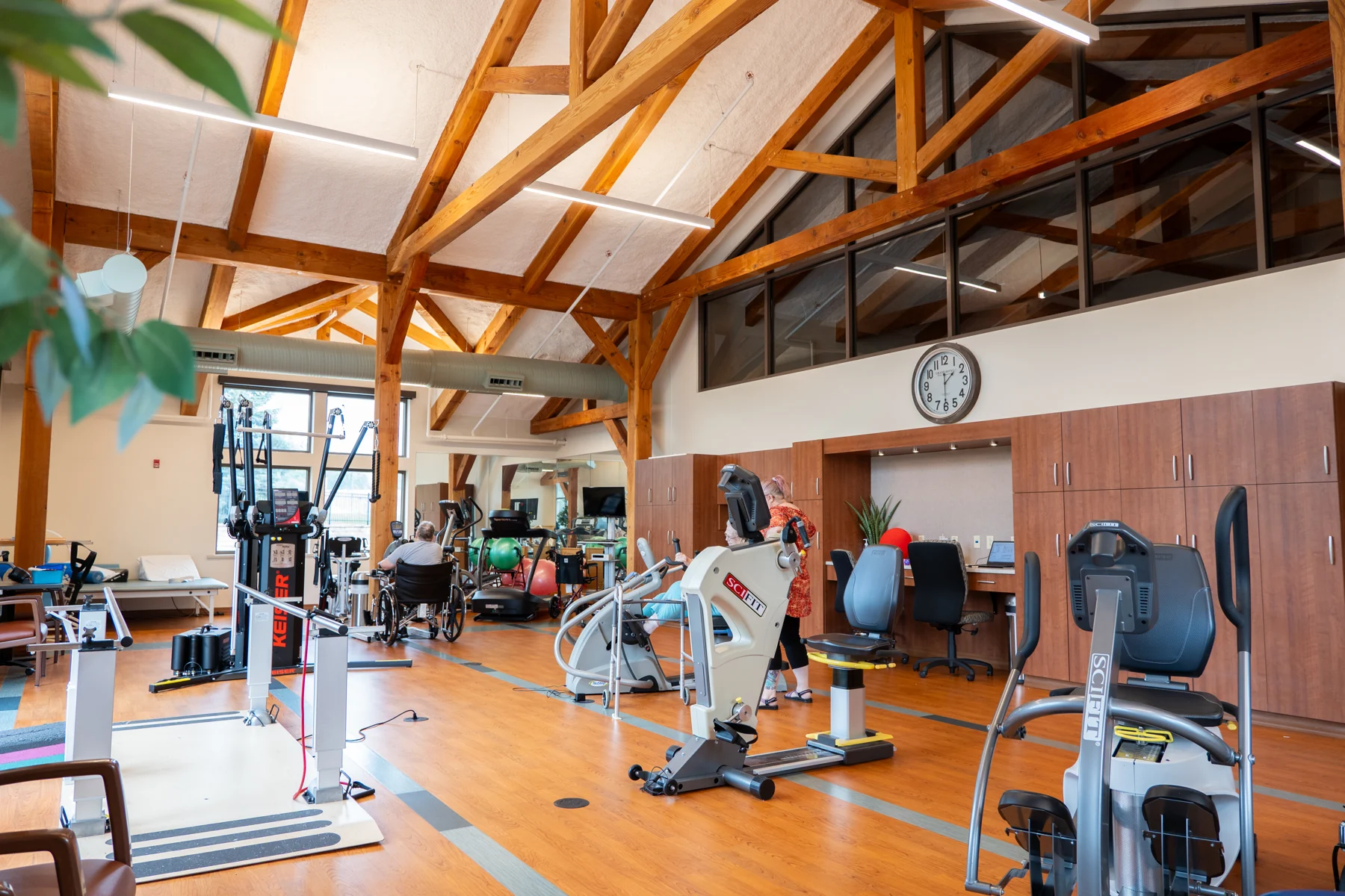 Residents and staff in the rehabilitation gym