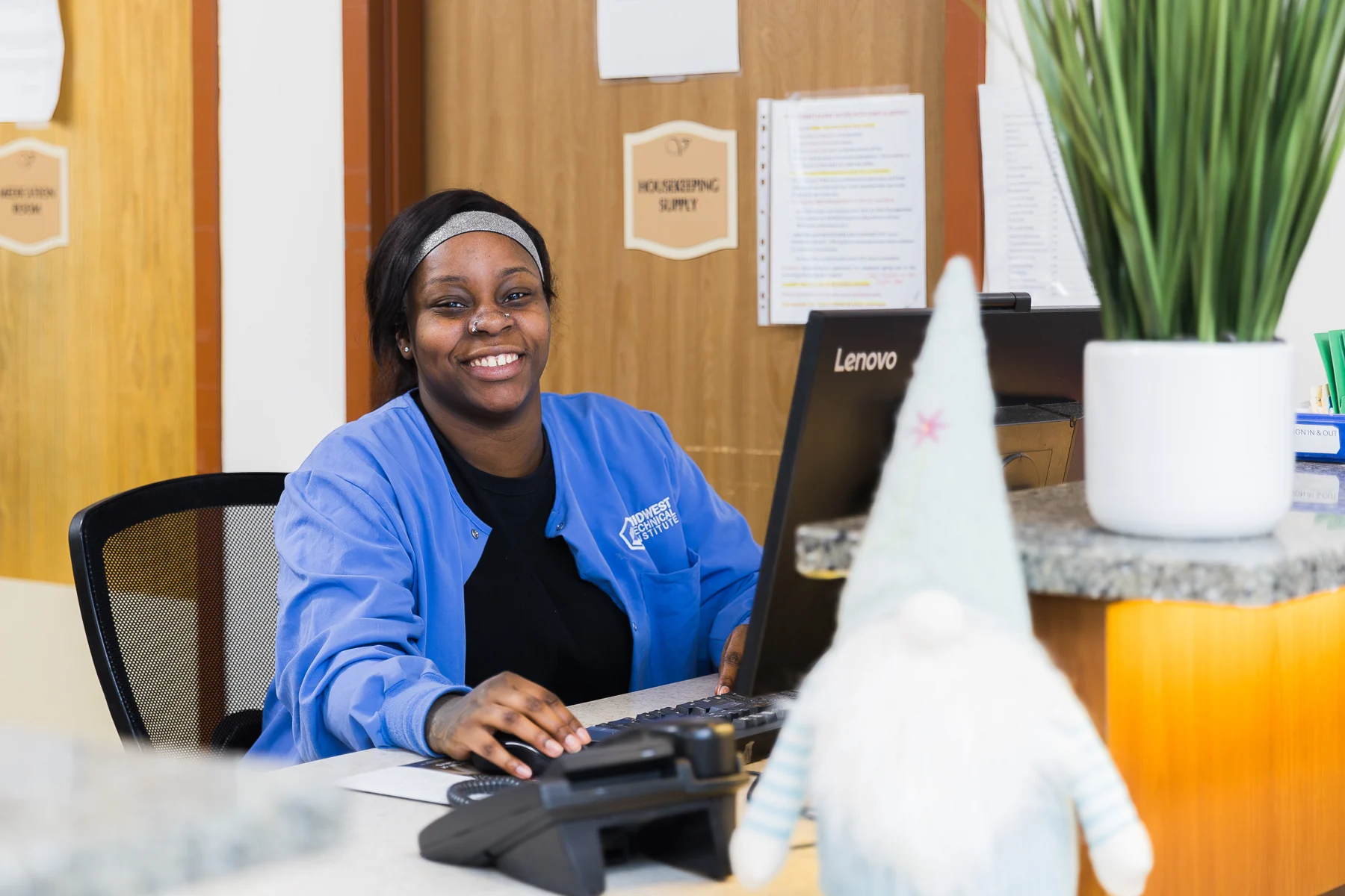 A Villas team member welcomes visitors with a smile